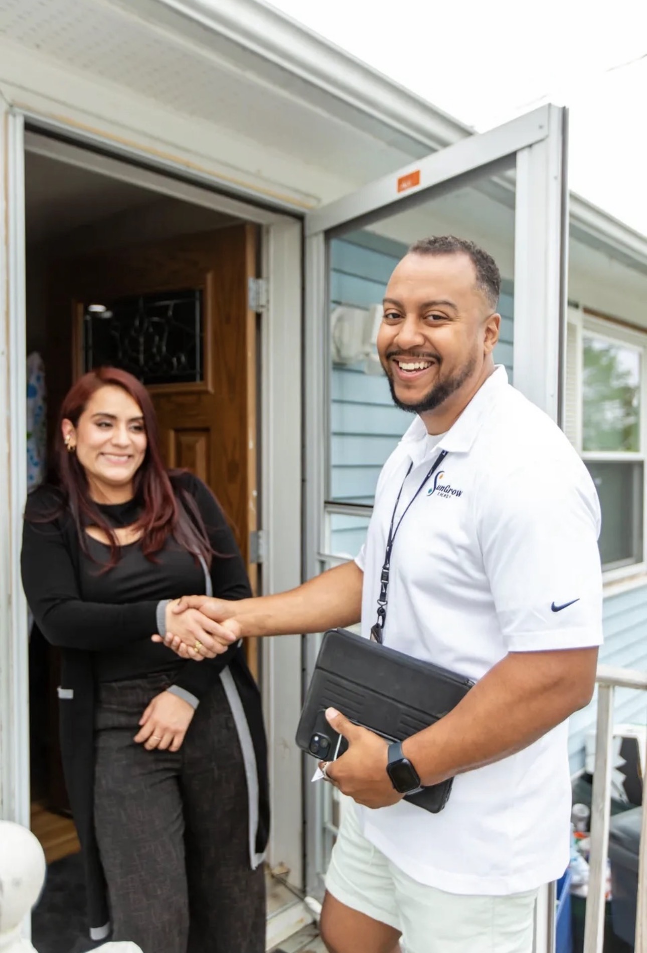 Jose Yapul, co-founder, greeting a homeowner